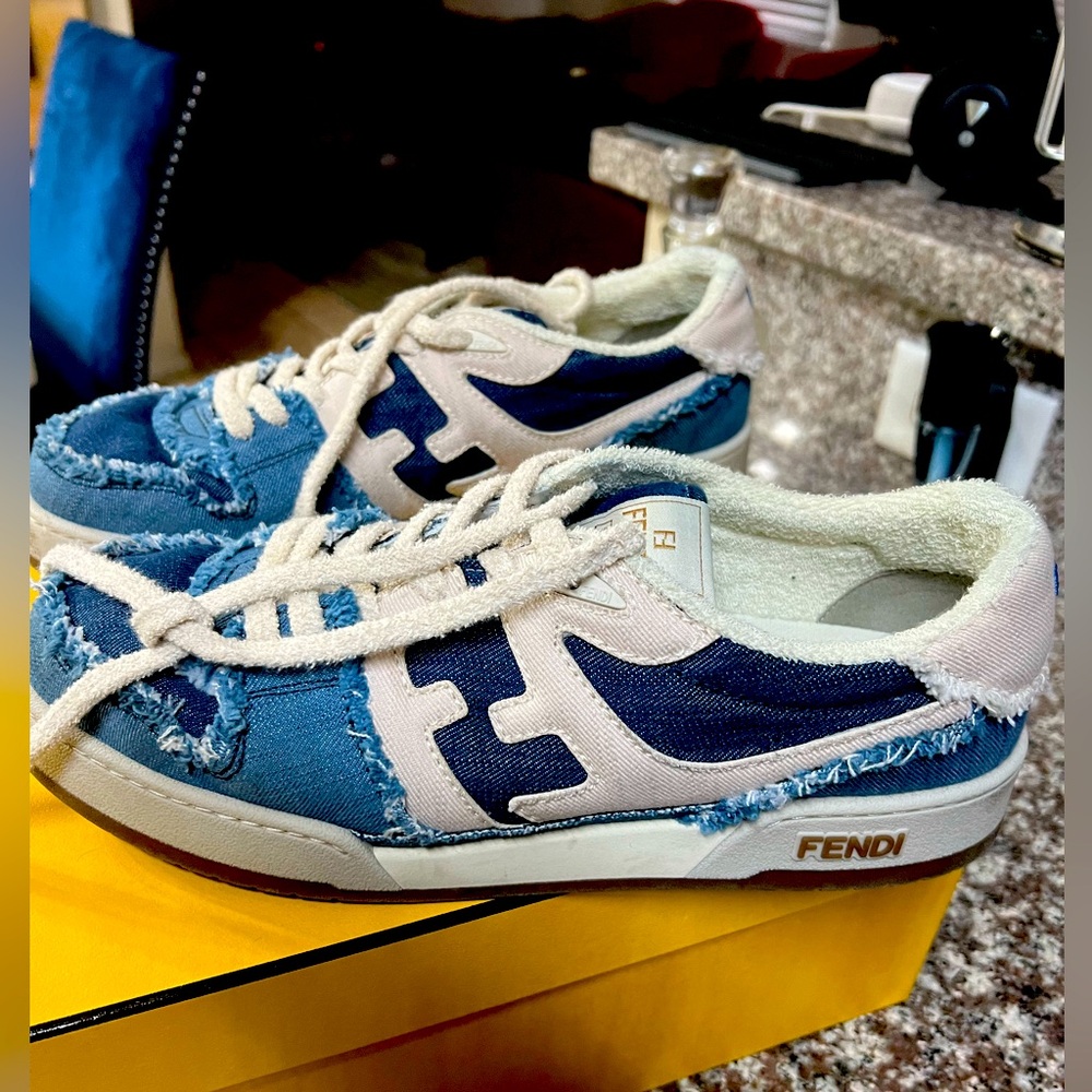 Fendi sneakers bought them in NYC used them 3 times almost like new..
